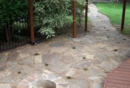 Flagstone patio/walkway with decomposed granite.