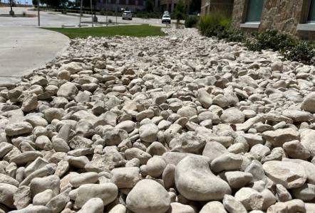 Blanco River Rock installed by Channell Landscaping