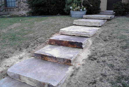 Oversized Oklahoma Slabs turned into beautiful steps leading up to the front door.