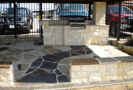 Austin kitchen, Oklahoma flagstone patio, and a Silvermist flagstone (grey) pathway leading to the grill.