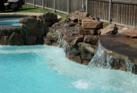 Moss Boulders used in a waterfall.