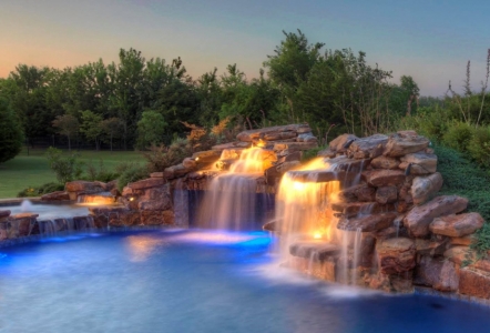 Moss Boulders were used to create this beautiful waterfall and pool built by El Dorado Pools.