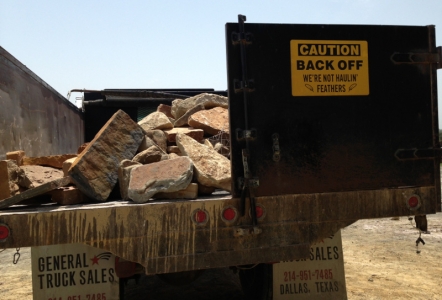 Back of Truck, opening the doors for the material to dump out.