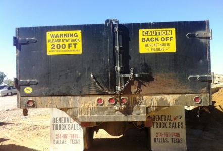 Dump Truck with long bed.   We can dump pallets out of this truck.