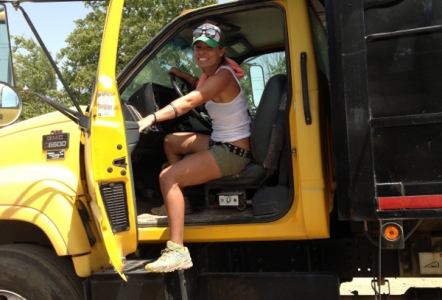Alyssa in a dump truck.