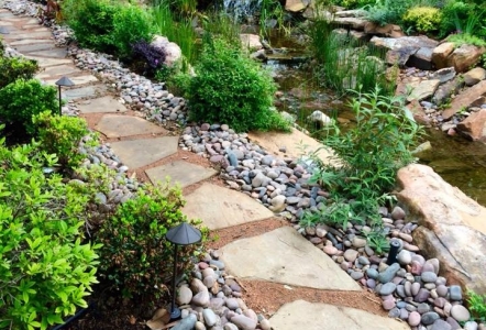 Oklahoma Flagstone walkway with Decomposed Granite and Arizona River Rock on edges