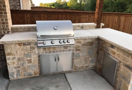 Sawn Lueders Slabs used as a countertop for this outdoor kitchen done by Rockwall Stone Design.