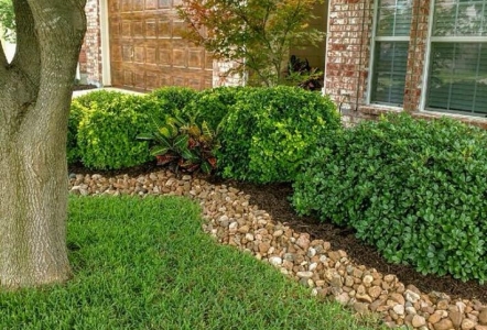 Cherokee River Rock used as edging. $225/yard