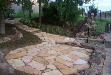 Flagstone patio with decomposed granite.