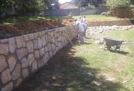 Millsap Builders Retaining Wall now in place of the old Railroad Tie wall.