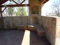 Outdoor fireplace area using Milsap Builders.