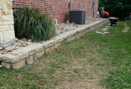 Millsap Builders Retaining Wall with Rainbow River Rock