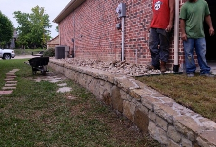 Millsap Builders Retaining Wall with Rainbow River Rock (view 2)