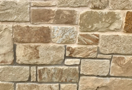 Chopped Millsap - top part has buff mortar joints,  bottom grey mortar joints